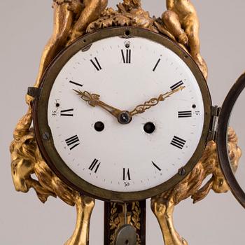 A PENDULUM CLOCK, first half of the 19th century.