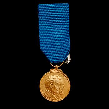 MEDALJ, 18 k guld, Sporrong, 1992. Vikt ca 5 g.