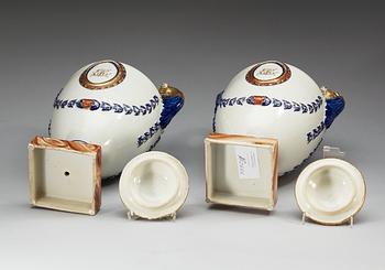 A pair of famille rose vases with covers, Qing dynasty, Qianlong (1736-95).