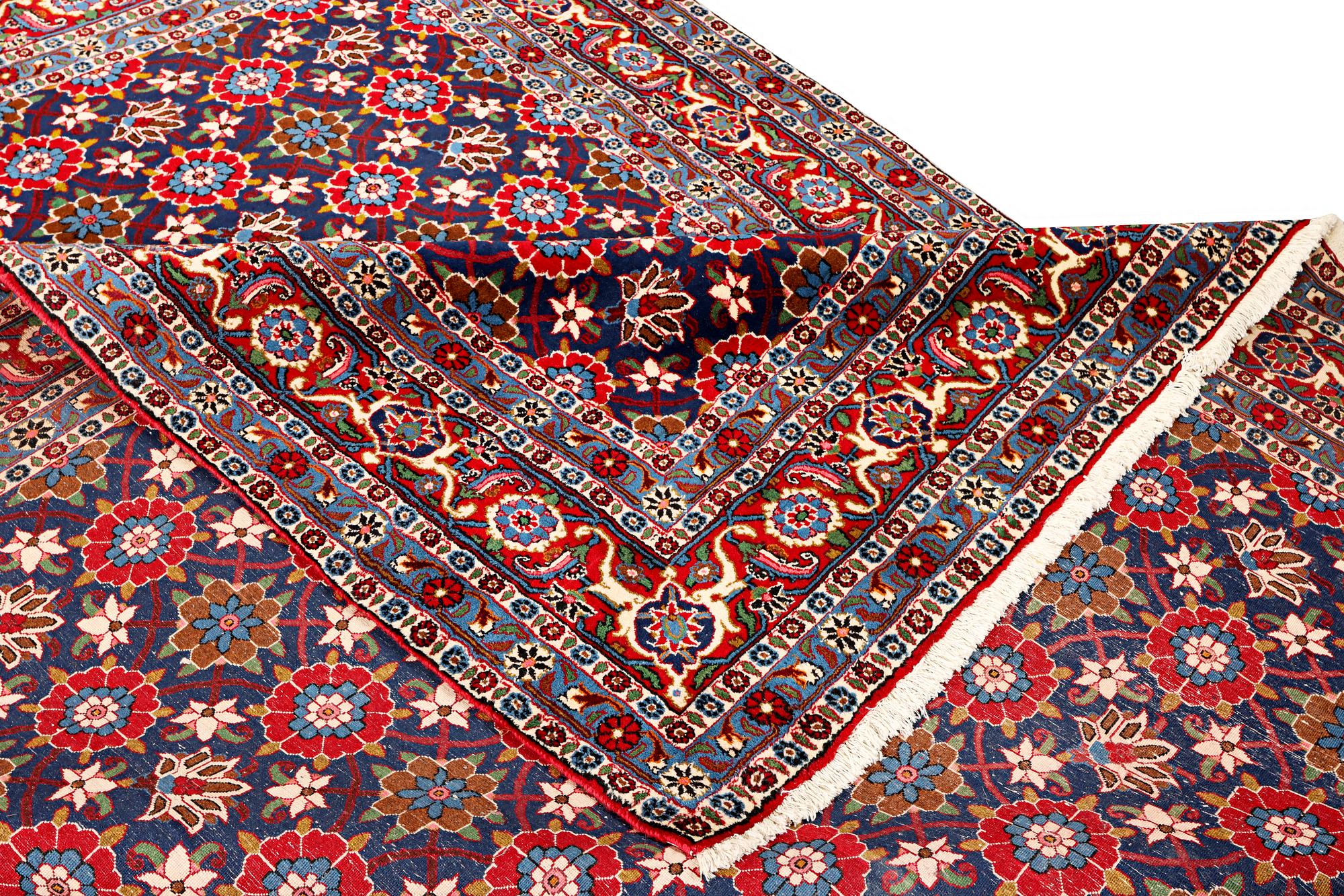 A semi-antique Vermain carpet, c. 339 x 233 cm.