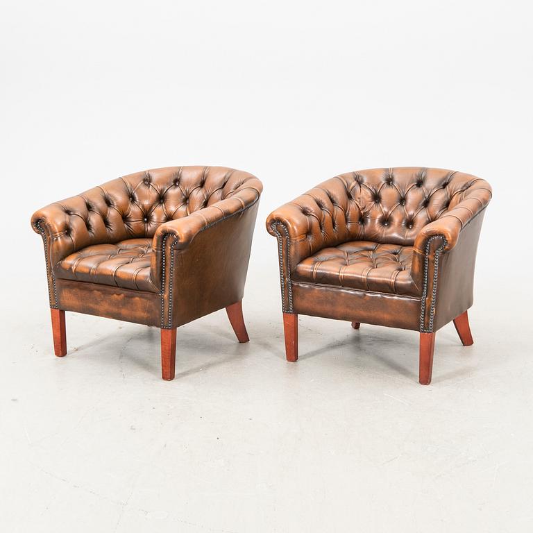 A pair of leather armchairs. second half of the 20th century.