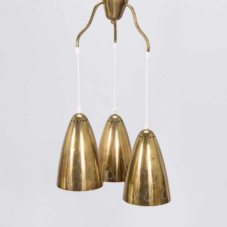 A mid-20th-century brass pendant ceiling light.