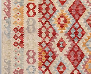 A Kilim carpet, ca 294 x 214 cm.
