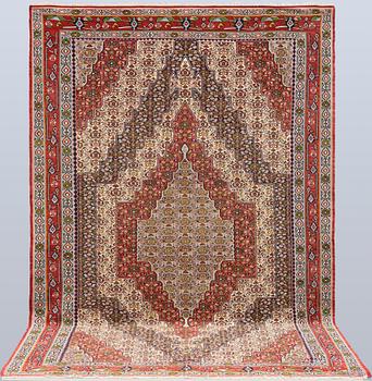 A Kelim Senneh carpet, 300 x 196 cm.