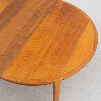 A walnut dining table from Linden, 1960s.