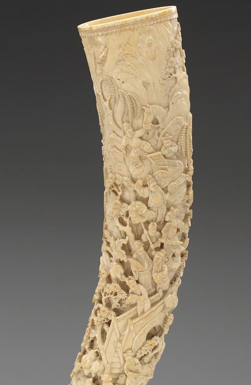 A finely carved ivory tusk, Qing dynasty, 19th Century.