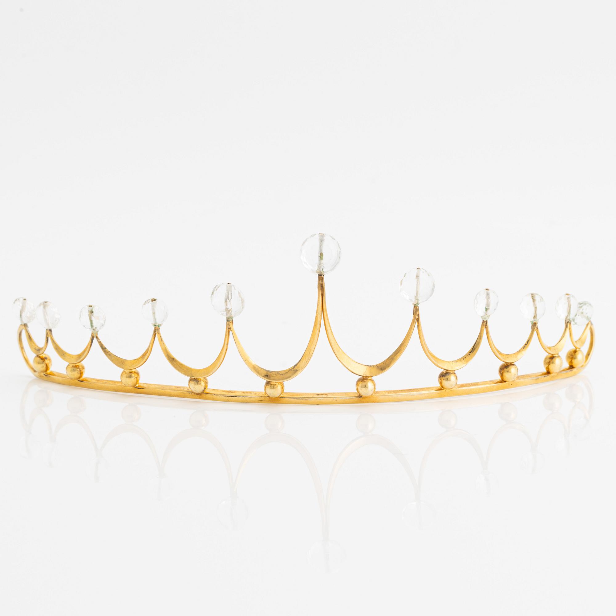 Tiara, gilded silver with faceted white topazes.