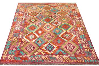 A Kilim carpet, c. 296 x 202 cm.