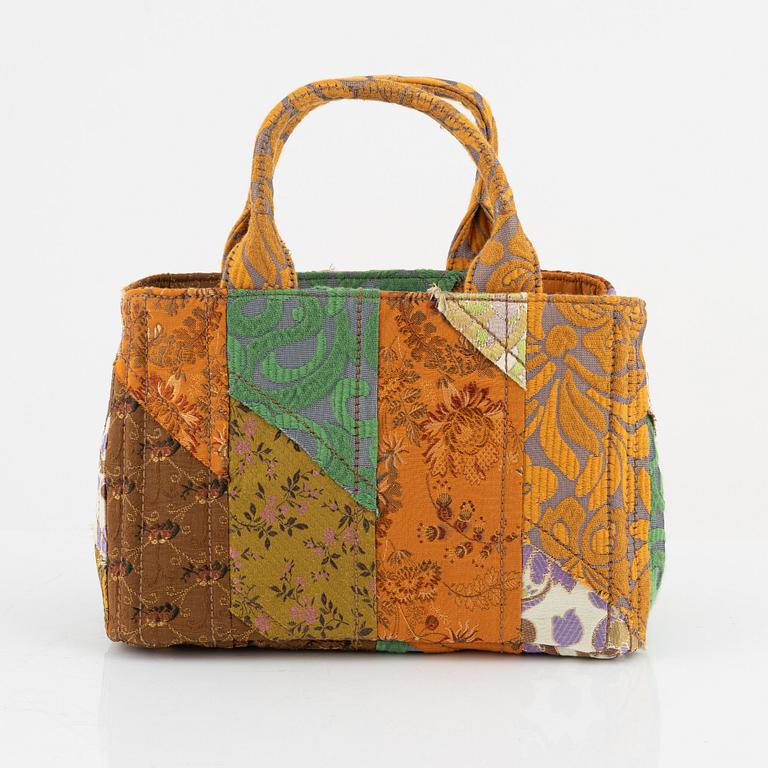 Prada, a embroidered silk 'Broccato patch' bag.