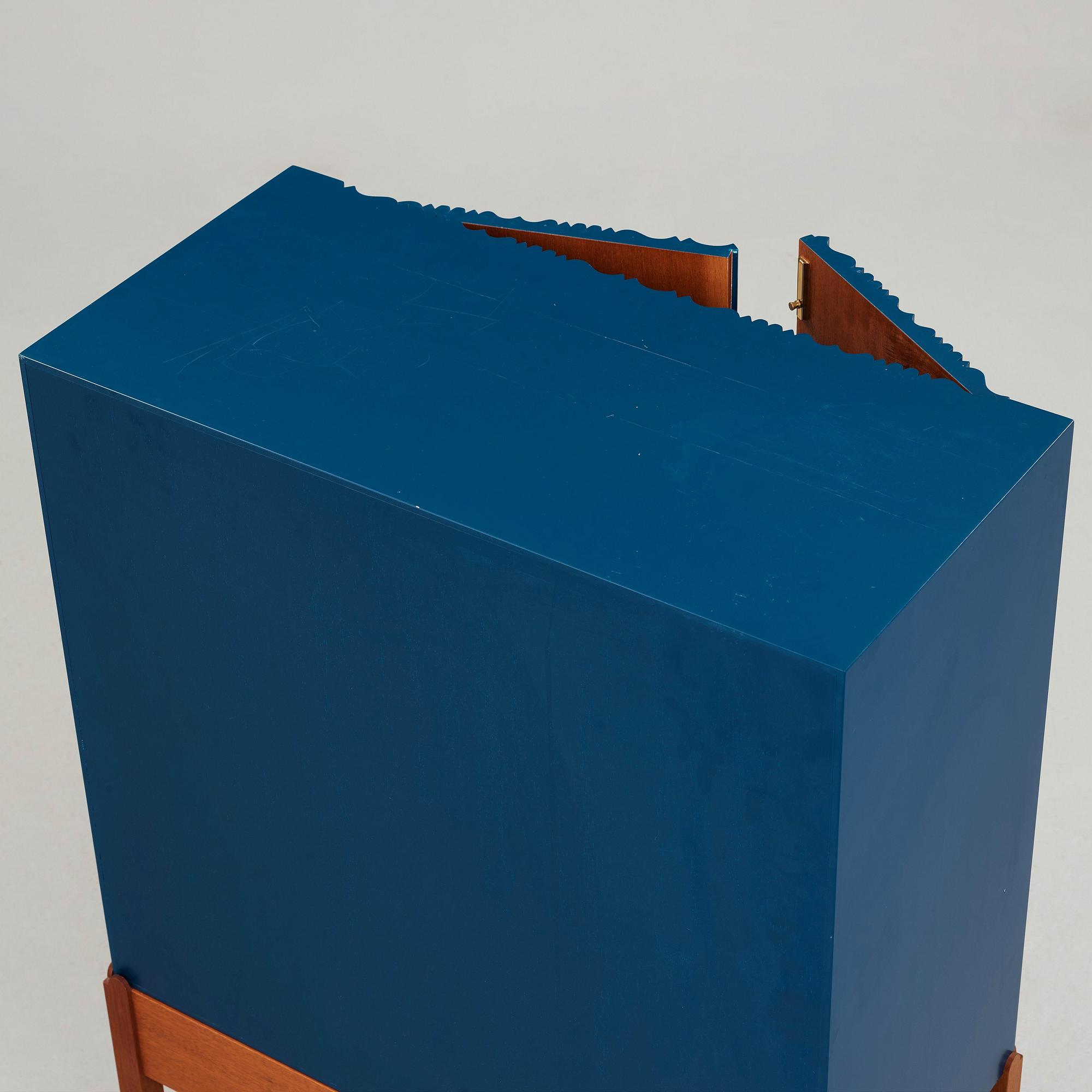 Josef Frank, a blue lacquered cabinet on stand, model nr 2192, by Svenskt Tenn, Sweden.