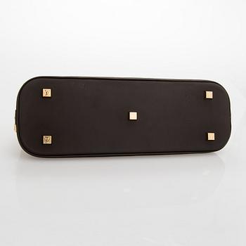 Louis Vuitton, a 'Monogram Mini Lin Alma Long Handbag'.