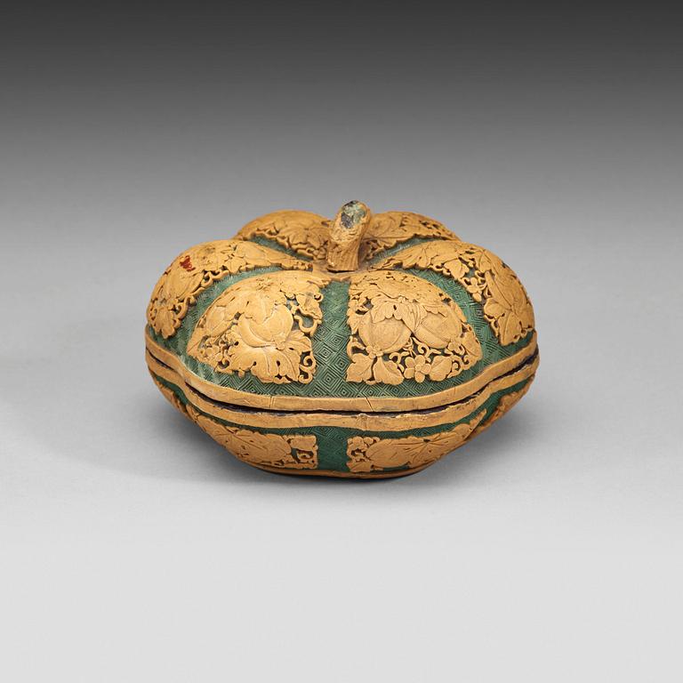 A green and yellow carved lacquer box with cover, Qing Dynasty (1644-1912).