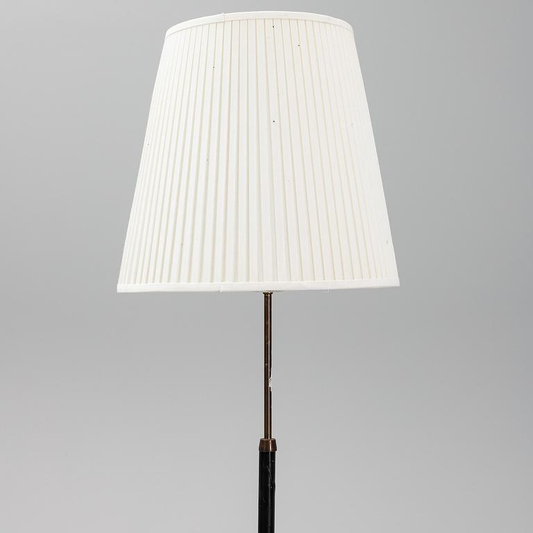 A '7071' floor lamp by Falkenbergs belysning.