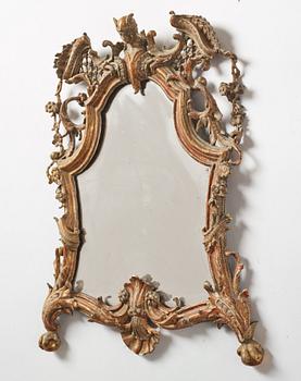 A gilt Rococo mirror, 18th Century.