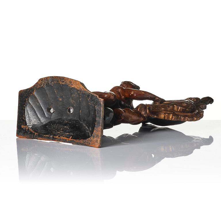 A Northern-European rococo carved pocket-watch holder, later part 18th century.