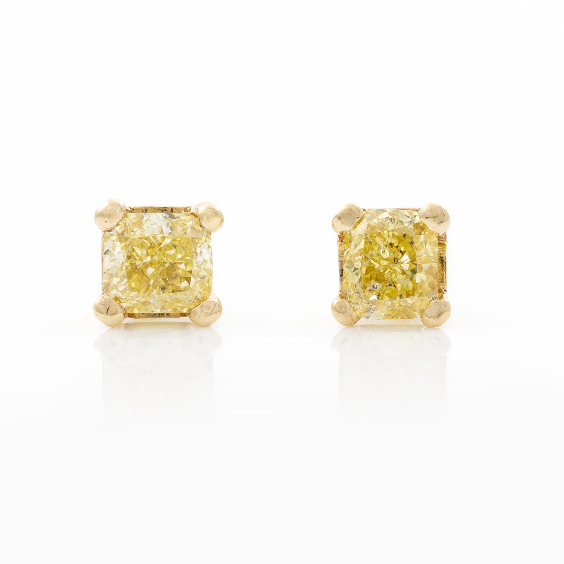 Earrings 14K gold with yellow radiant-cut diamonds.