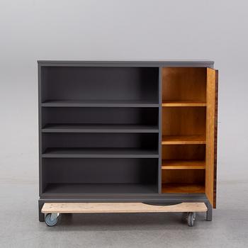 A first half of the 20th Century painted book case.