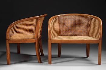 A pair of Carl Hörvik polished birch armchairs, Stockholm 1920.