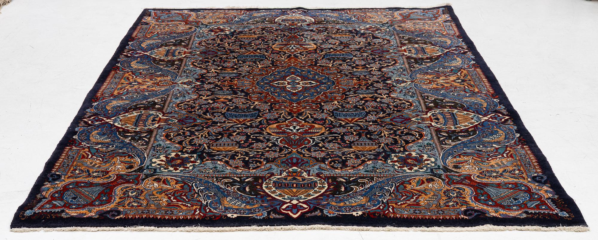 A Kashmar carpet, c. 295 x 198 cm.