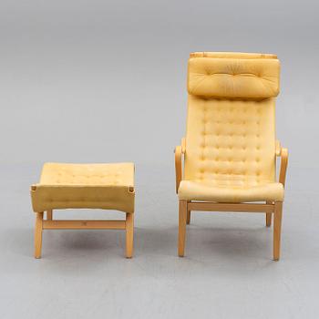 A Bruno Mathsson arm chair, 'Pernilla', Firma Karl Mathsson, late 20th century.