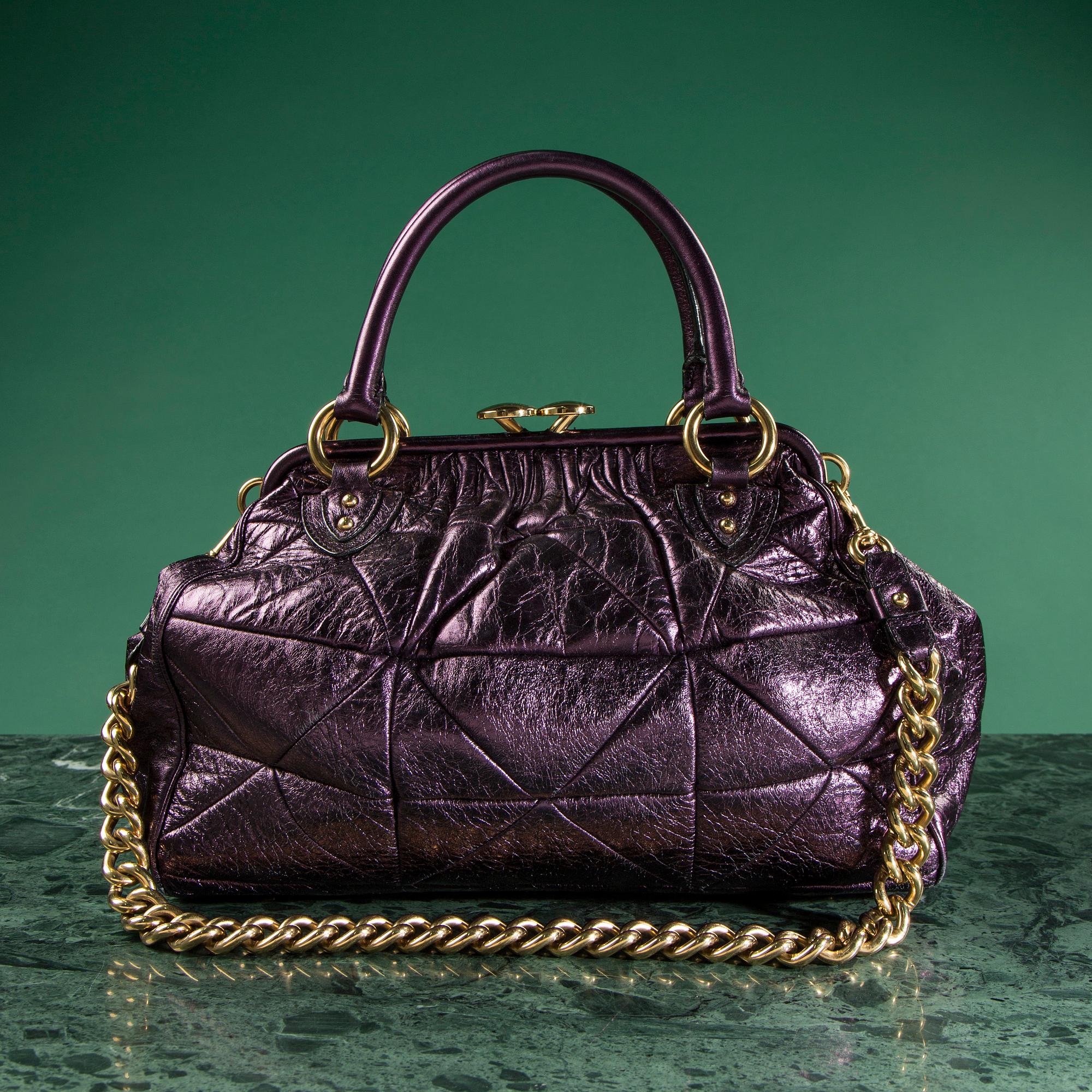 A bag by  MARC JACKOBS.