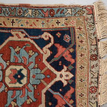 A CARPET, an antique Heriz, 476,5 x 344,5 cm.