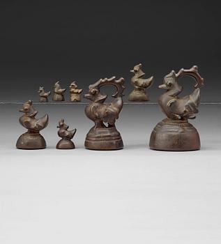 212. A set of eight Burmese bronze weights, 19th century.