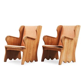 531. A pair of stained pine armchairs attributed to Axel Einar Hjorth, Nordiska Kompaniet, Sweden 1930's.