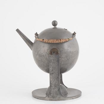 Nils Fougstedt, a tea kettle on stand model "A 942", Firma Svenskt Tenn, Stockholm 1929.