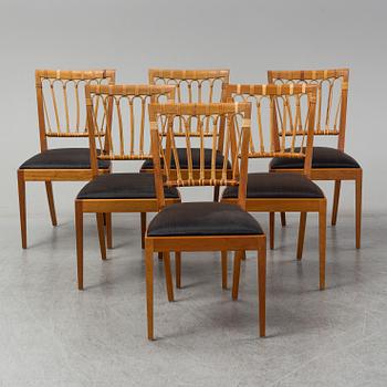 A set of six mahogany and rattan dining chairs, Josef Frank, , model 1165, Svenskt Tenn, Stockholm.