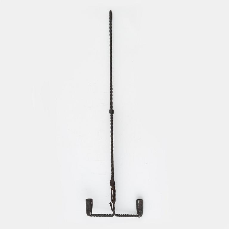 A wrought-iron two-light candlestick, 19th/20th Century.