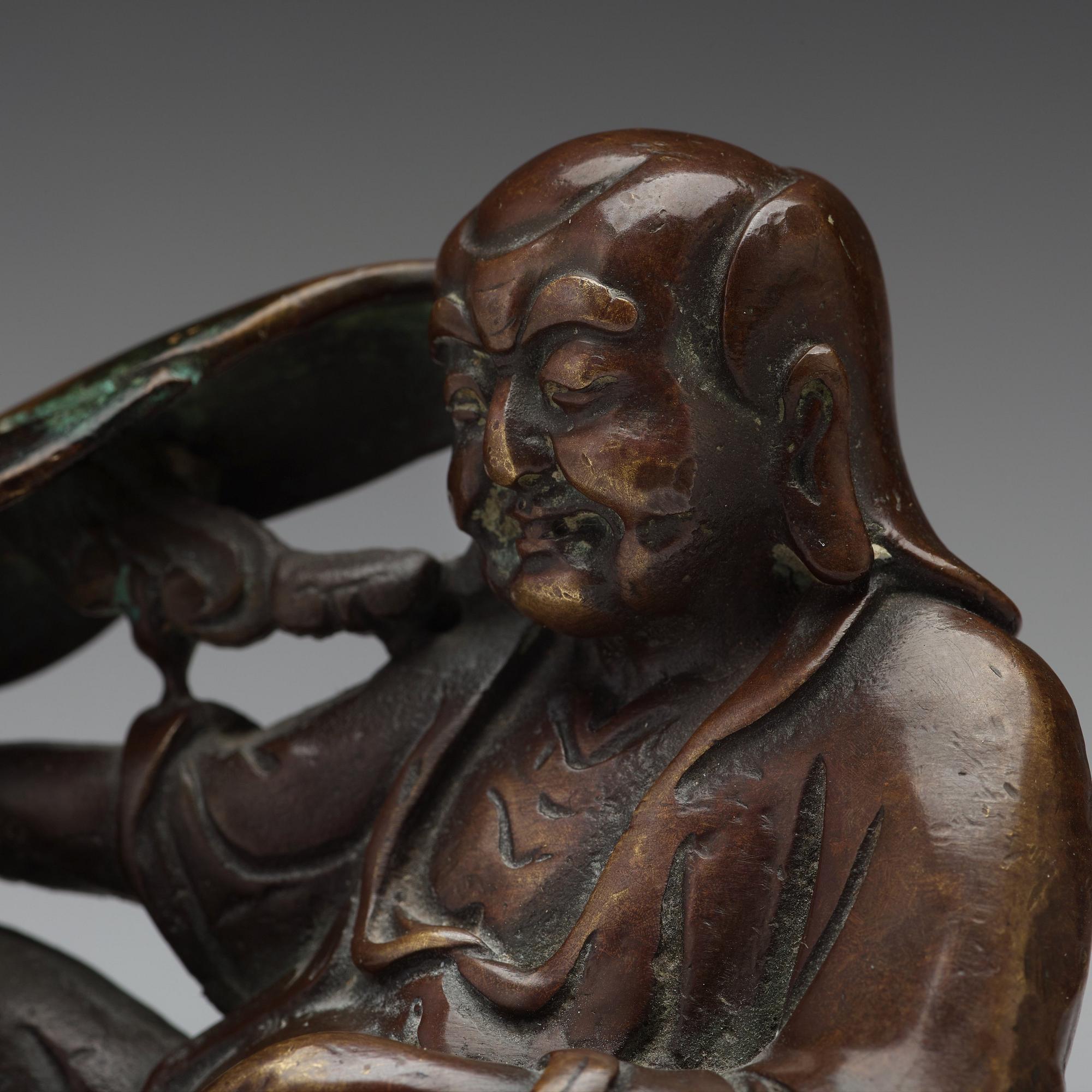 A bronze sculpture of one of the immortals, Qing dynasty, 18/19th Century.