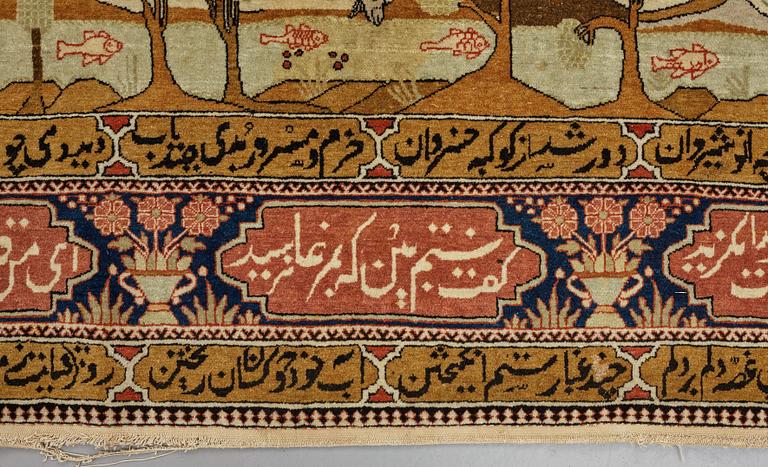 A RUG, a semi-antique Kashan figural, possibly Motachem, ca 202 x 140 cm.