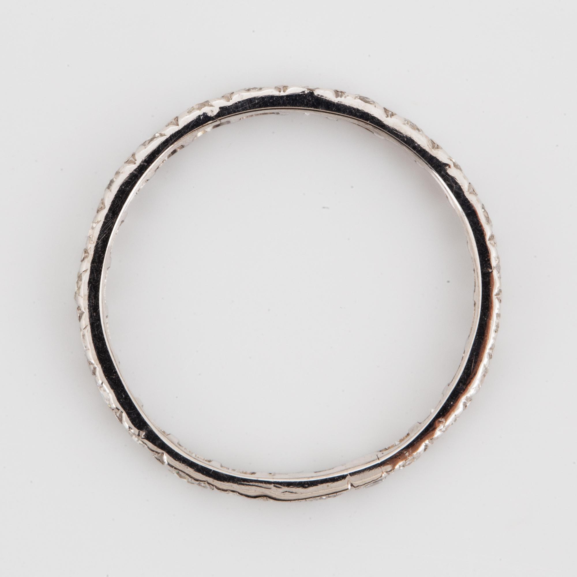 White gold brilliant-cut diamond eternity ring.