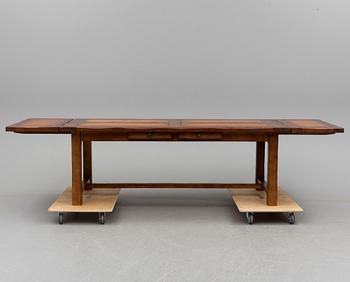 A circa 2000 dinner table by Engelsson.