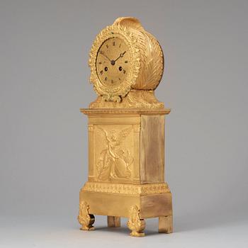A French Empire 19th century gilt bronze mantel clock.