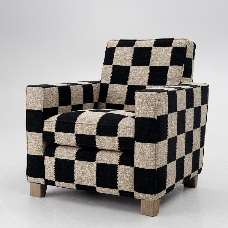 A 'Caspian Club Chair' by RIJD, contemporary.