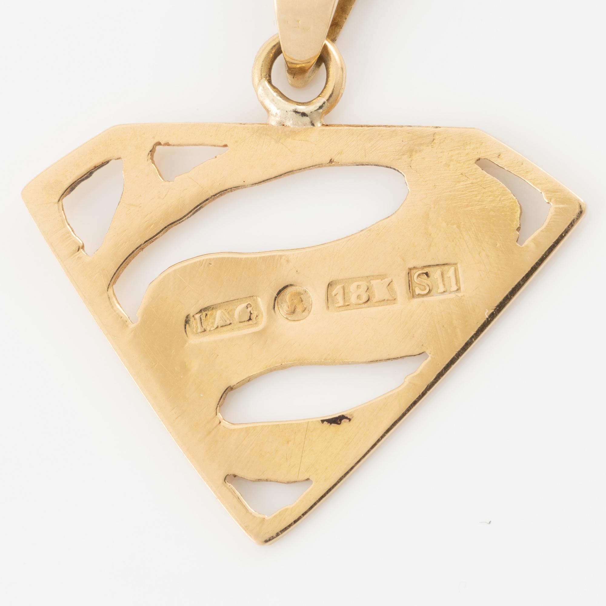 Pendant with chain and a pair of earrings, 18K gold, in the form of Superman/Superwoman logo.