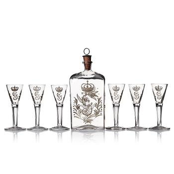 292. A set of six 18th Century glasses and a bottle, Sweden, 18th Century with King Gustavus IIIs monogram.