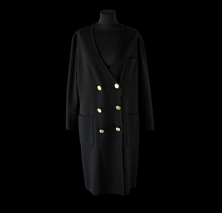 A 1970s black knitted wool coat dress by Yves Saint Laurent.