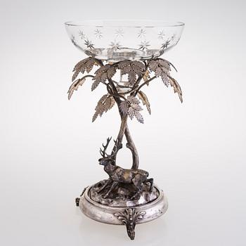 A silver-plated centrepiece with fitted cut glass bowl, late 19th Century.