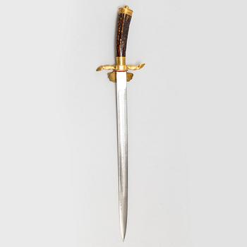 An early 20th Century hunting sword with scabbard.