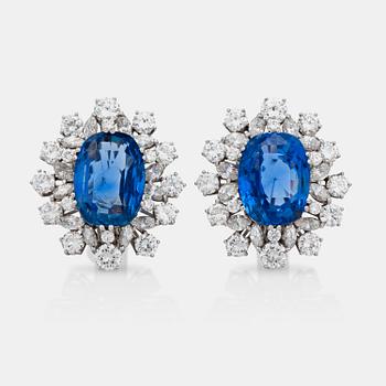 1155. A pair of 9.92 ct and 10.28 ct unheated ceylon sapphires and diamond earclips.