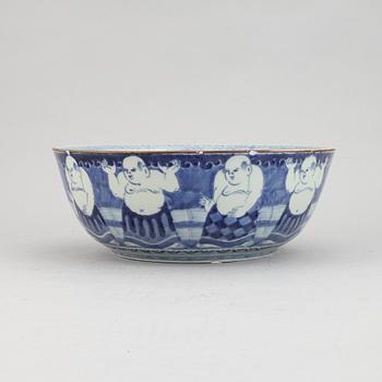 A Japanese blue and white stoneware bowl around the year 1900.