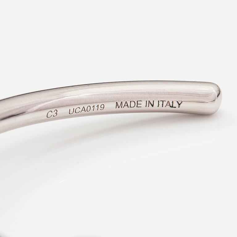 Céline, A "Knot" bracelet made of silver coloured metal. Marked Celine, C3 UCA0119 Made in Italy.