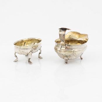 A Swedish Parcel-Gilt Silver Rococo Creamer and Salt Cellar, 18th century.