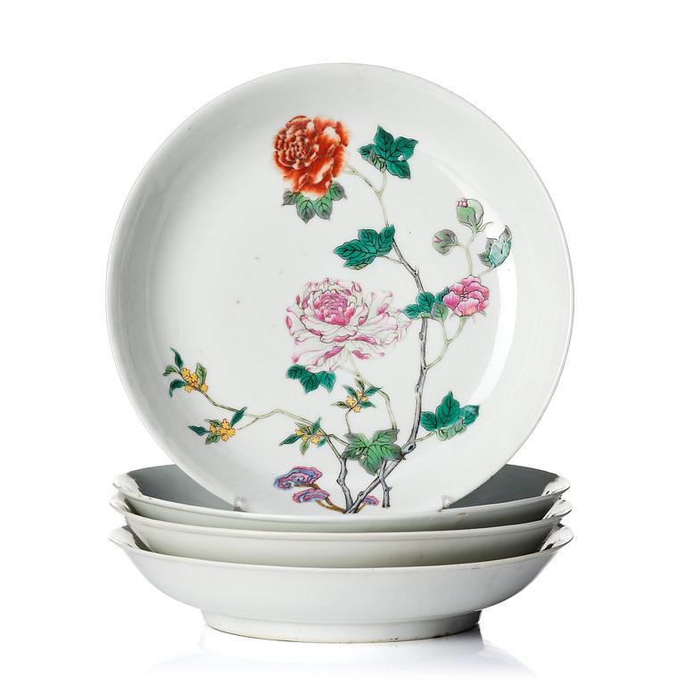 A set of four famille rose floral dishes, Qing dynasty with a apocryphal six character mark.