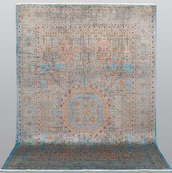An oriental carpet with a Mamluk pattern, ca 299 x 210 cm.