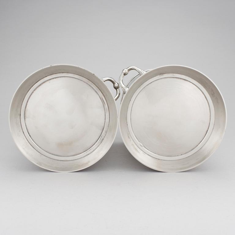 2 champagne coolers in white metal, modern manufacturing.