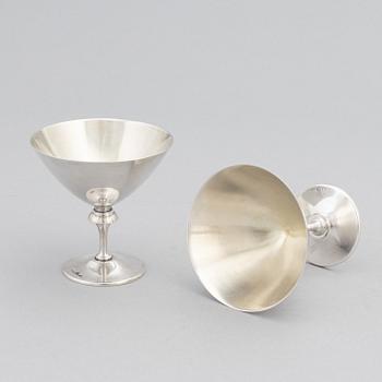 A silver plated shaker, C.G. Hallberg and a set of twelwe cocktail glasses, GAB, second half of the 20th Century.